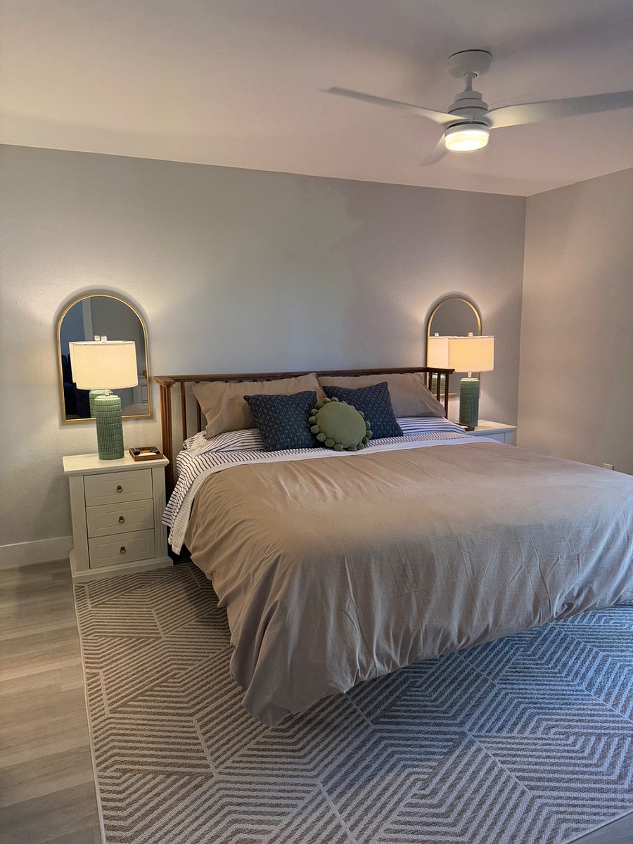Primary bedroom. Beautyrest king-sized bed with super soft linens and a fluffy duvet. 