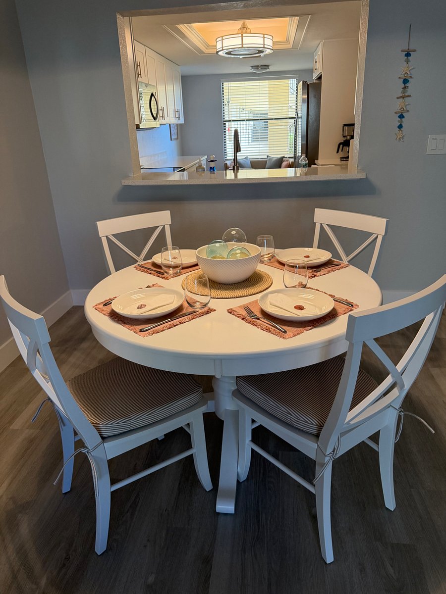 46 inch dining table and padded chairs.