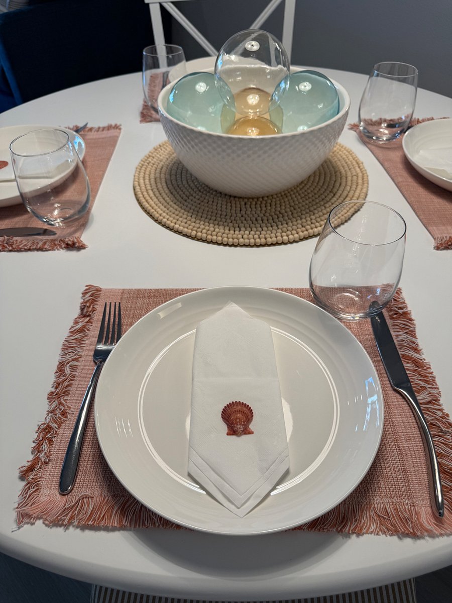 Lovely table setting with new dishes and glassware.