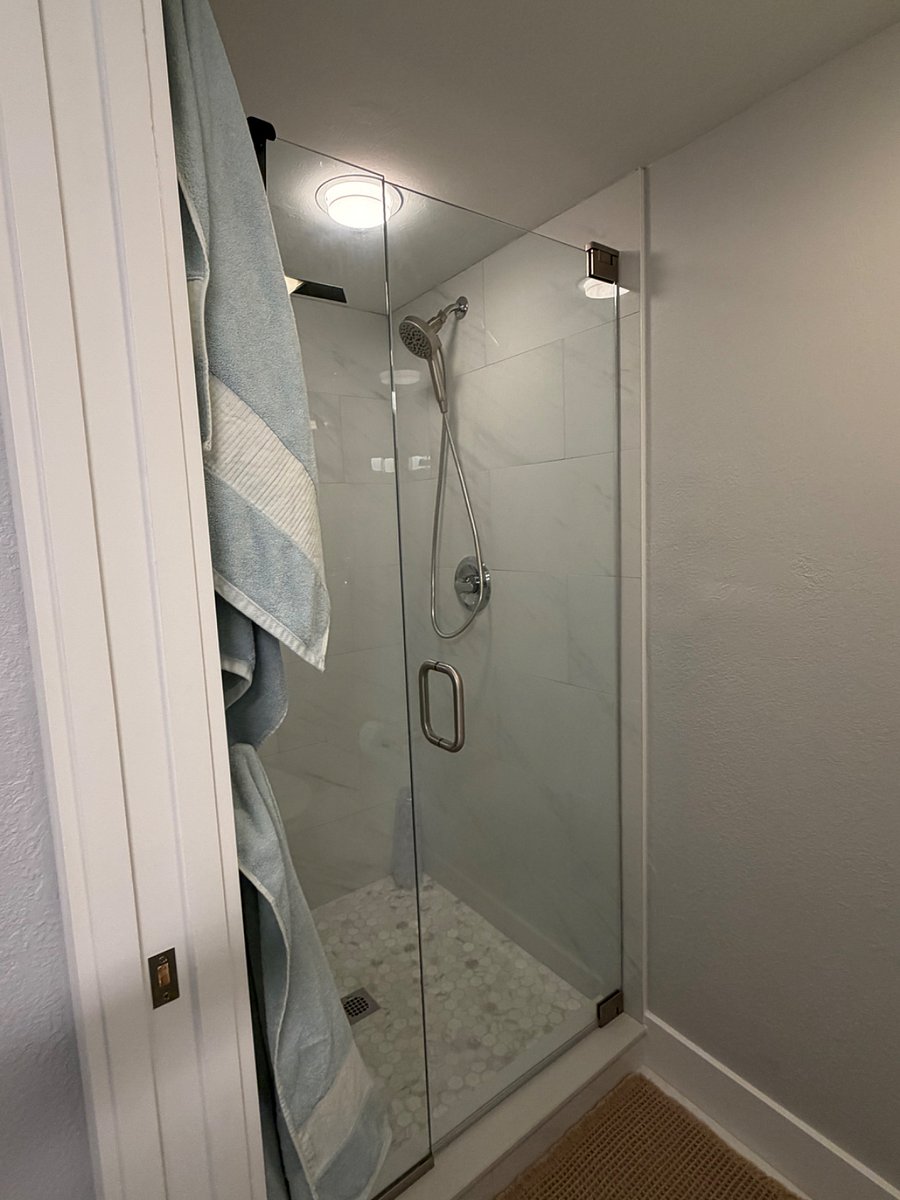 Gorgeous, neutral tiles in this primary bath shower.