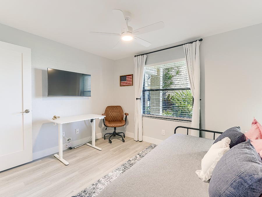 Adjustable height desk, office chair and Smart TV