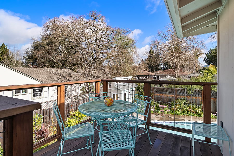 Private deck right outside front door, overlooking pool and lush gardens.