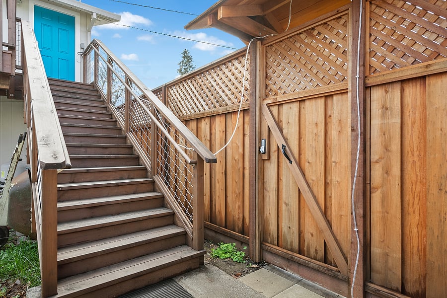 Steps up to second floor unit, behind private, locked gate. Keyless entry.