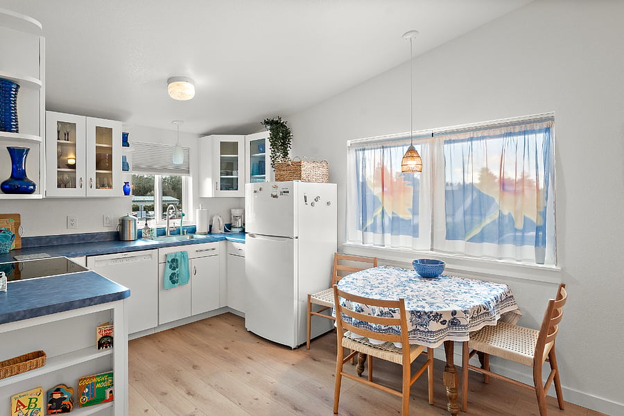 Dining area with large picture window facing West for sunset views.