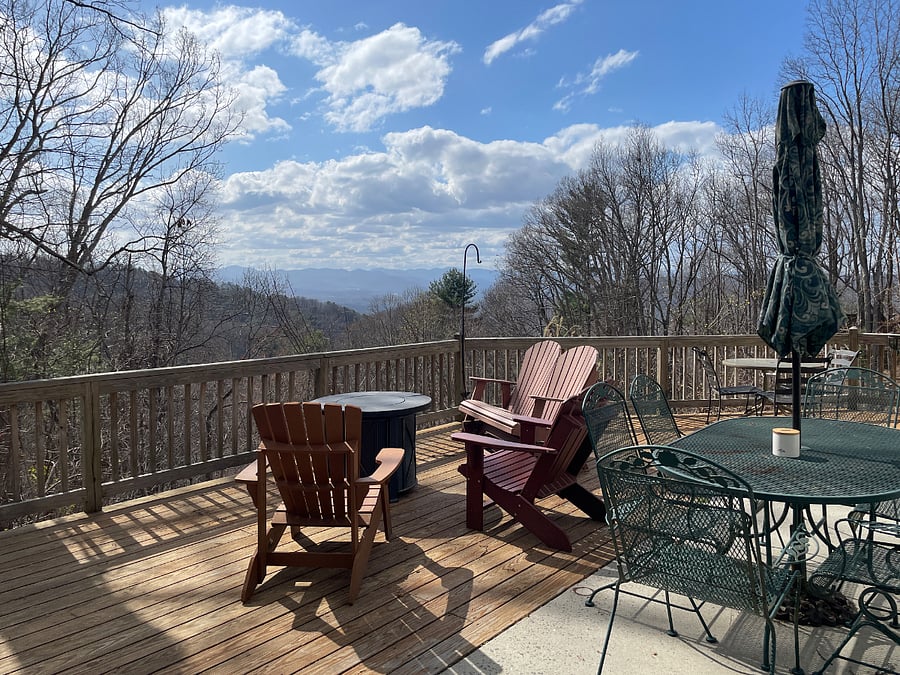 Back patio/deck with gas grill and gas fire pit. Initial tank provided, you will need to refill after.