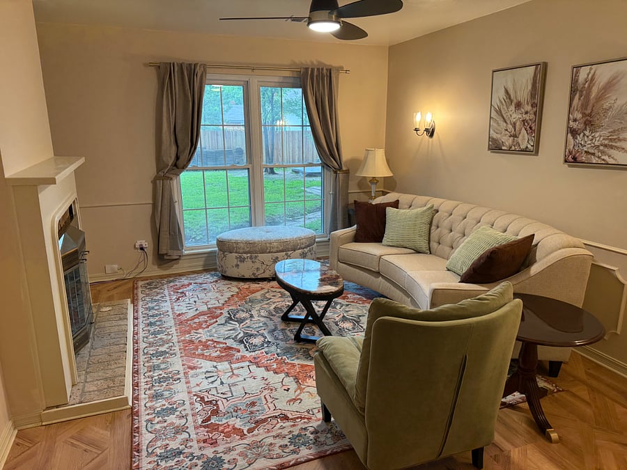 Formal Living Room, Woodburning Fireplace shares with Fmaily room. Great place for quite, study, or work.
