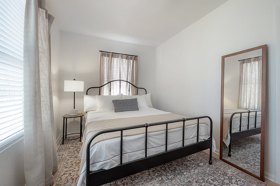 Primary bedroom at the back of the house with Queen sized bed and comfortable mattress