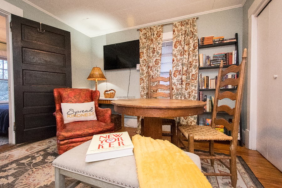 crazy living room with second TV and a futon for guests