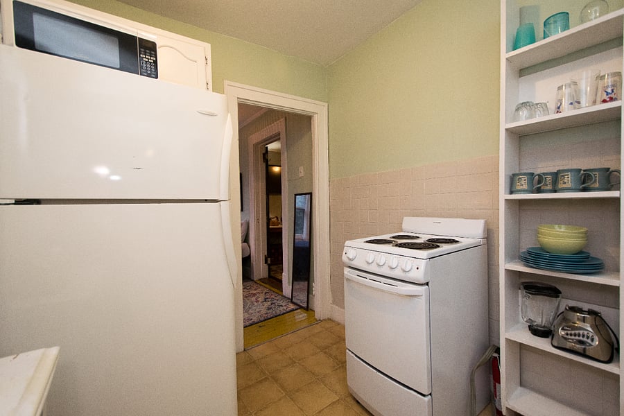 fully stocked kitchen off 2nd sleeping area