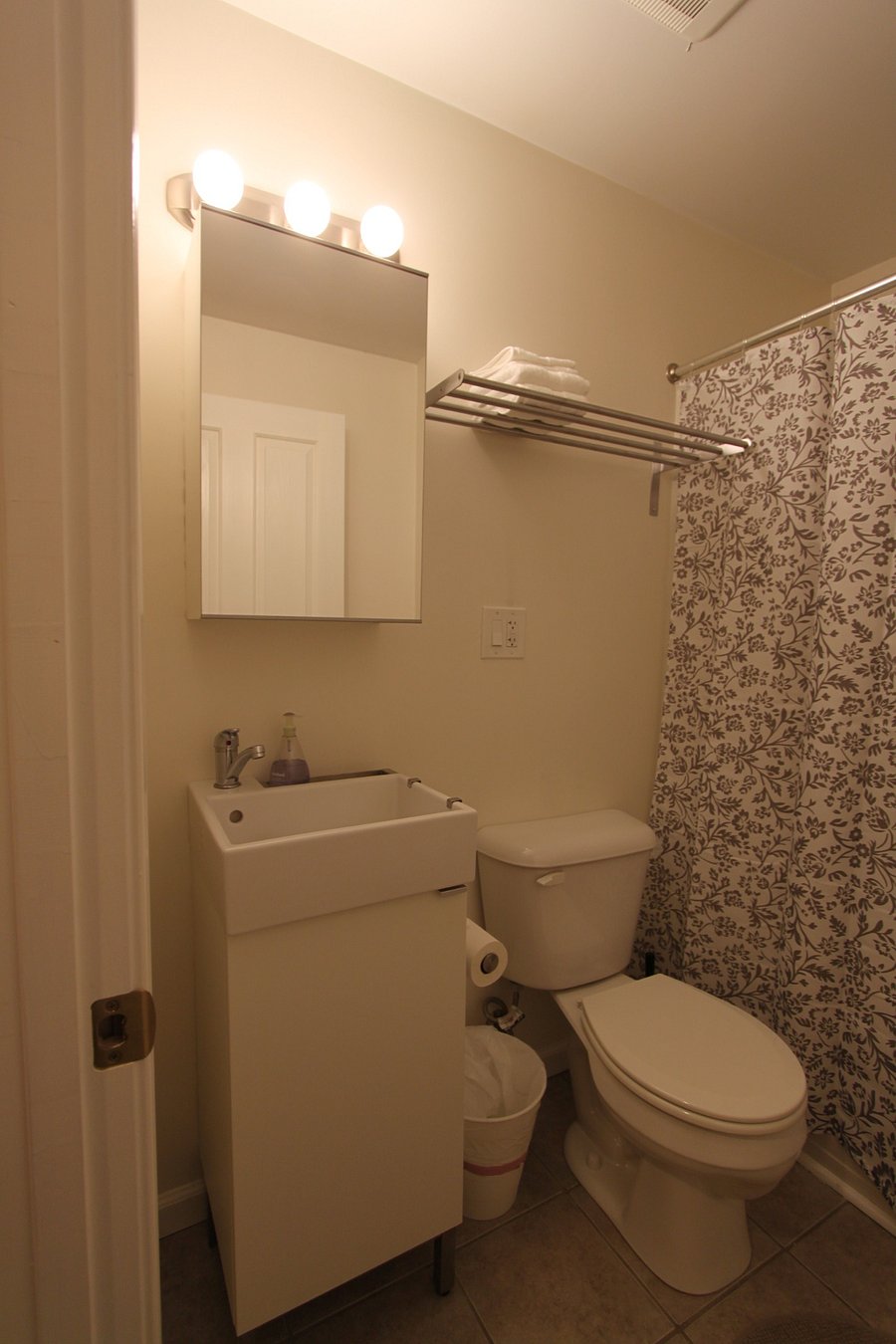 Bathroom; Has sink, toilet, and bathtub with shower