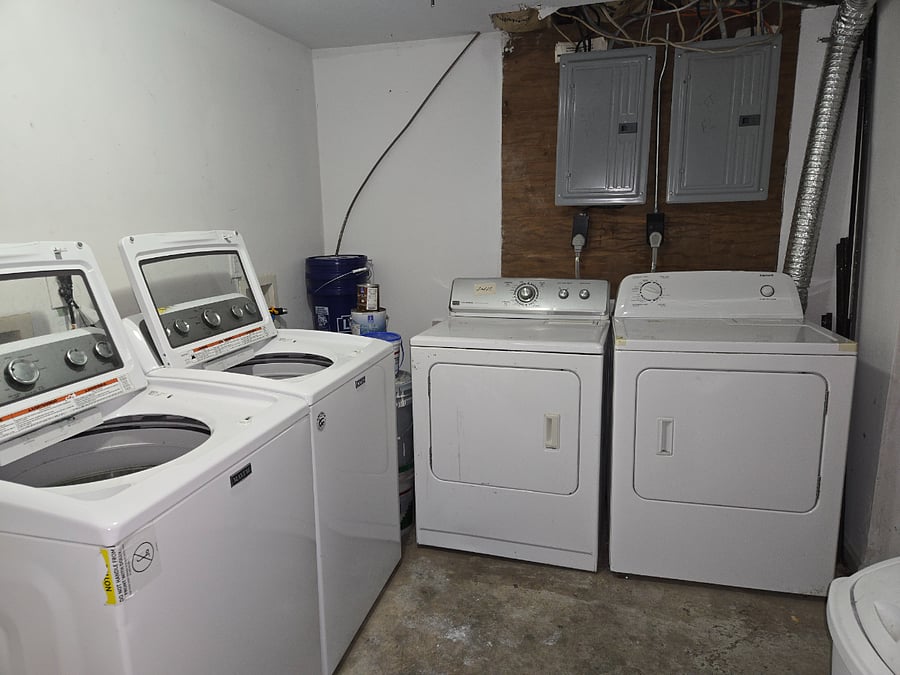 Shared laundry room in common area