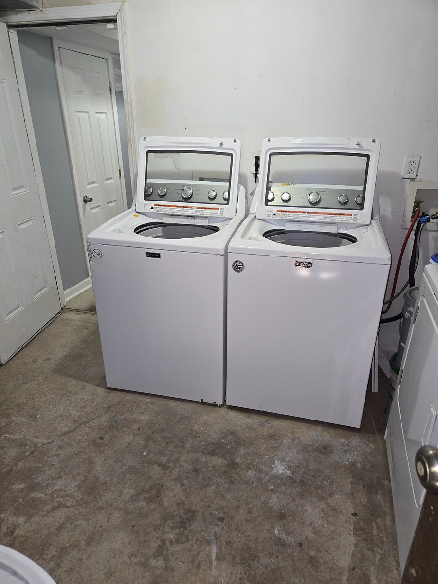 Shared laundry room in the basement common area