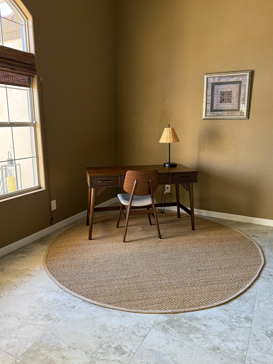 Den with desk, chair and bookcase. Wireless Cox internet