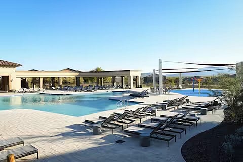 Lounge in the sun by the pool at the Presidio Residents Club