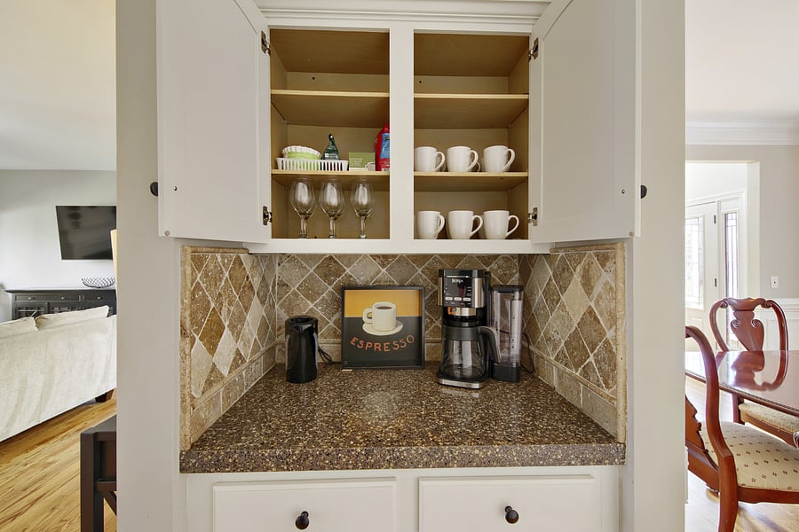 Fully stocked kitchen with coffee bar for everyday living