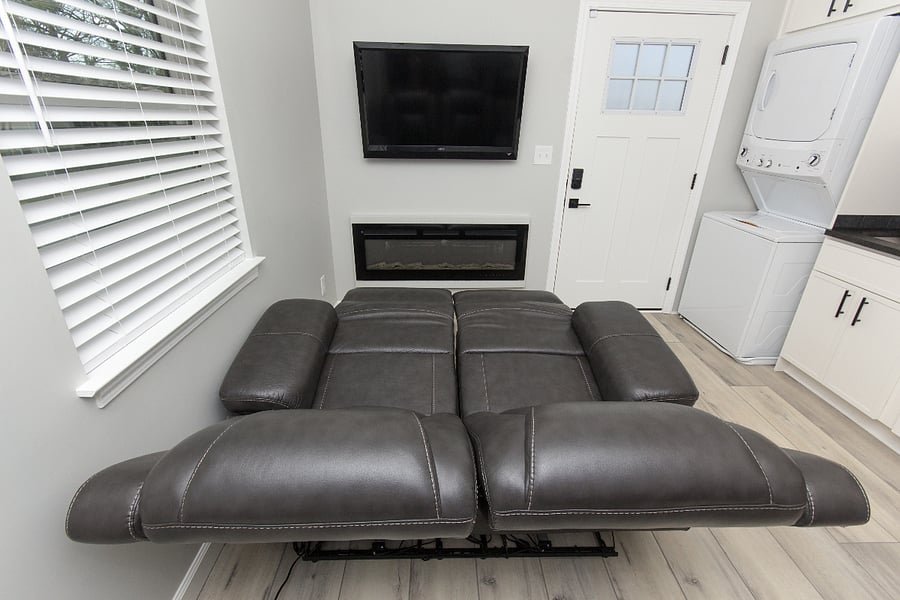 Dual power-reclining loveseat with power headrest and USB charging.