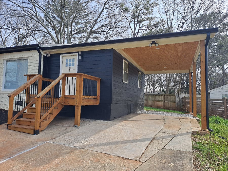 Assigned covered and attached carport parking. Private front sitting porch.