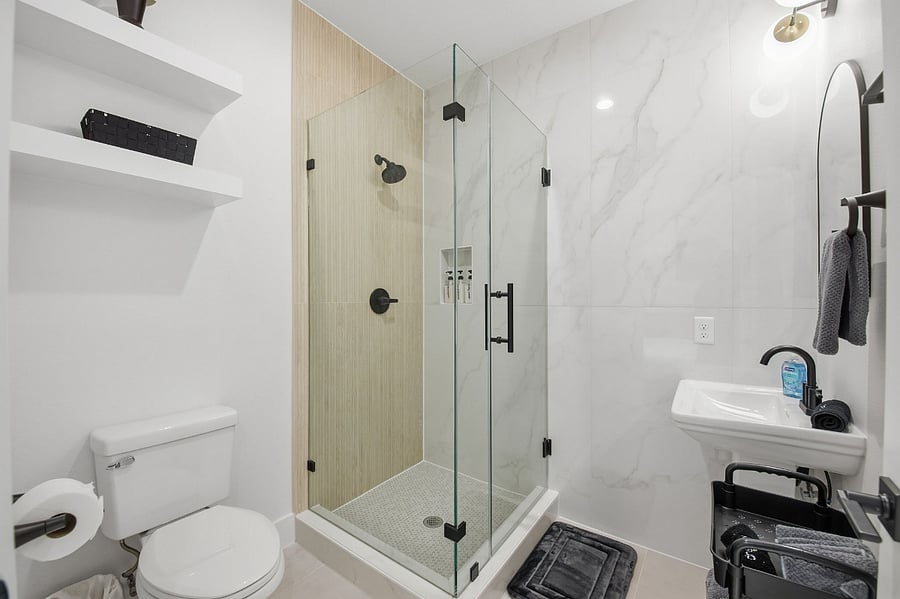 Full Bathroom 2 includes air conditioning and hot water for comfort and convenience. The bathroom is stocked with shampoo and shower gel, and a hair dryer is provided for guest use.