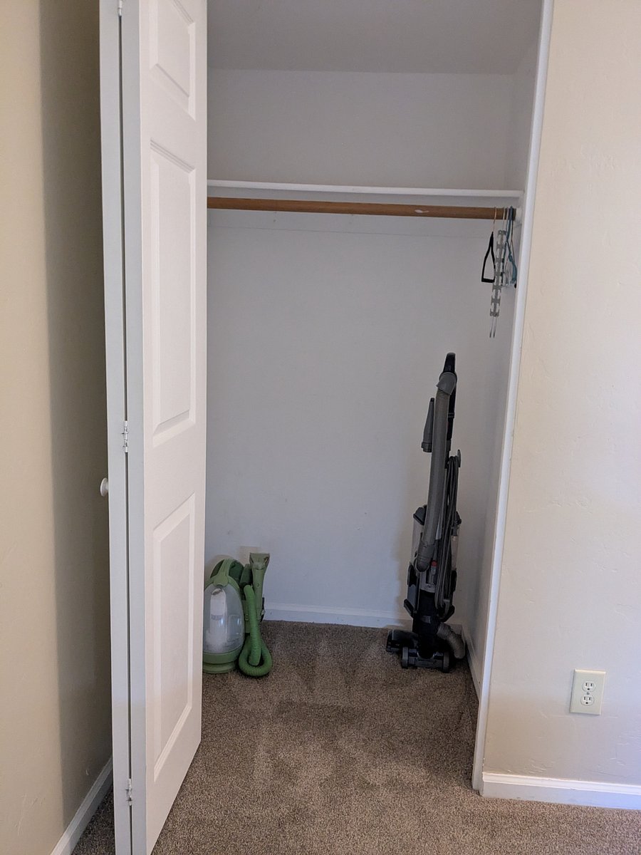 The closet in the second bedroom offers additional storage.