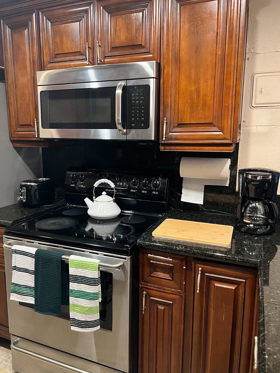 kitchen, contains dishwasher and full size fridge with ice maker