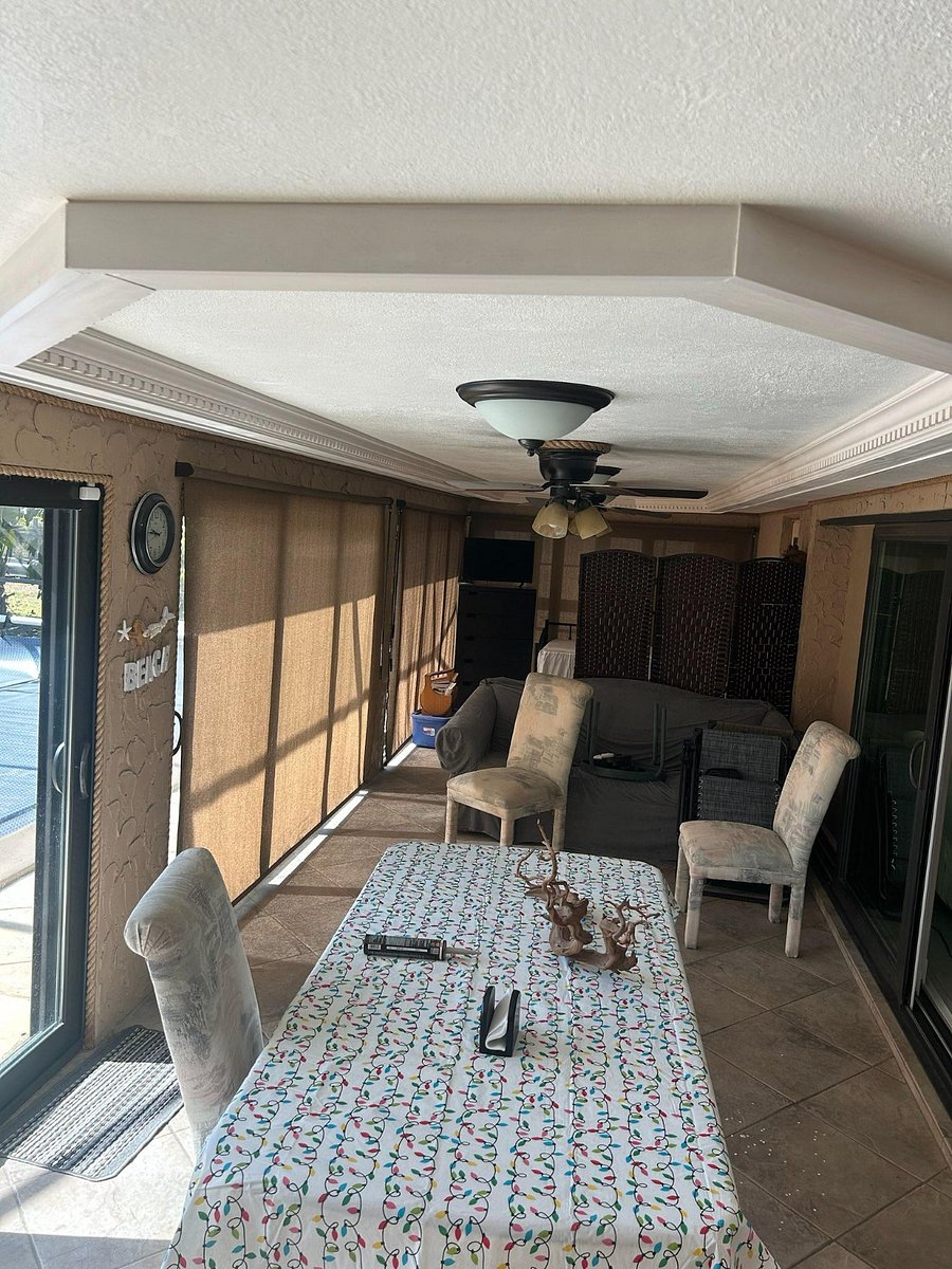 Lanai with the roll down shades with a trundle bed to be used as queen bed or two twin beds.  A pull out couch queen with portable folding dividers for privacy
