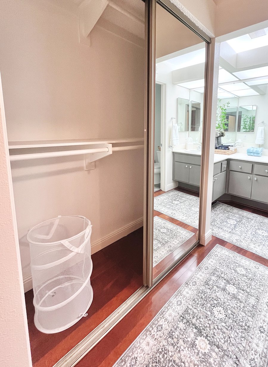 Stay organized together in the extra mirrored closet, thoughtfully designed with plenty of space for couples.