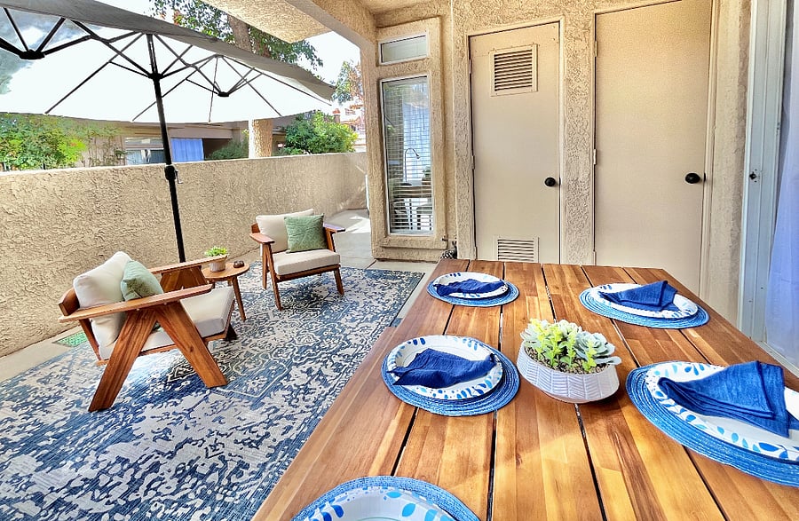 Dine in style at the outdoor dining area for six, featuring a chic table and comfortable seating perfect for alfresco meals, entertaining, or enjoying the serene surroundings.