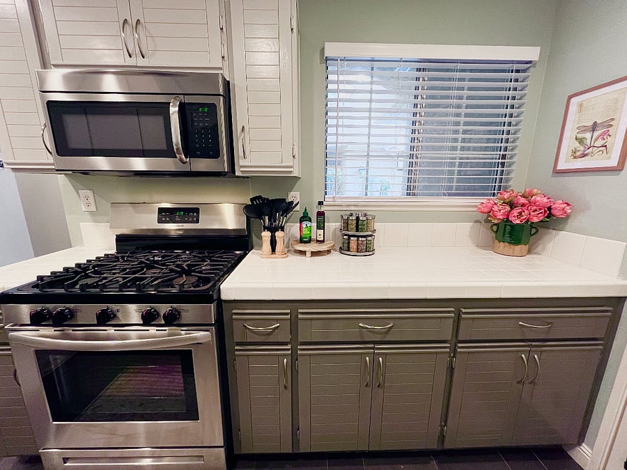 New Gas Range and Microwave, plus Air Fryer, Blender, and Toaster (not pictured), Full Spice Rack, Premium Condiments, and Complete Cookware & Utensils  perfect for quick and easy meals.