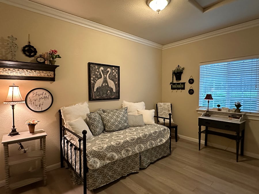 Trundle bed with a pull out twin underneath which sleeps two.
