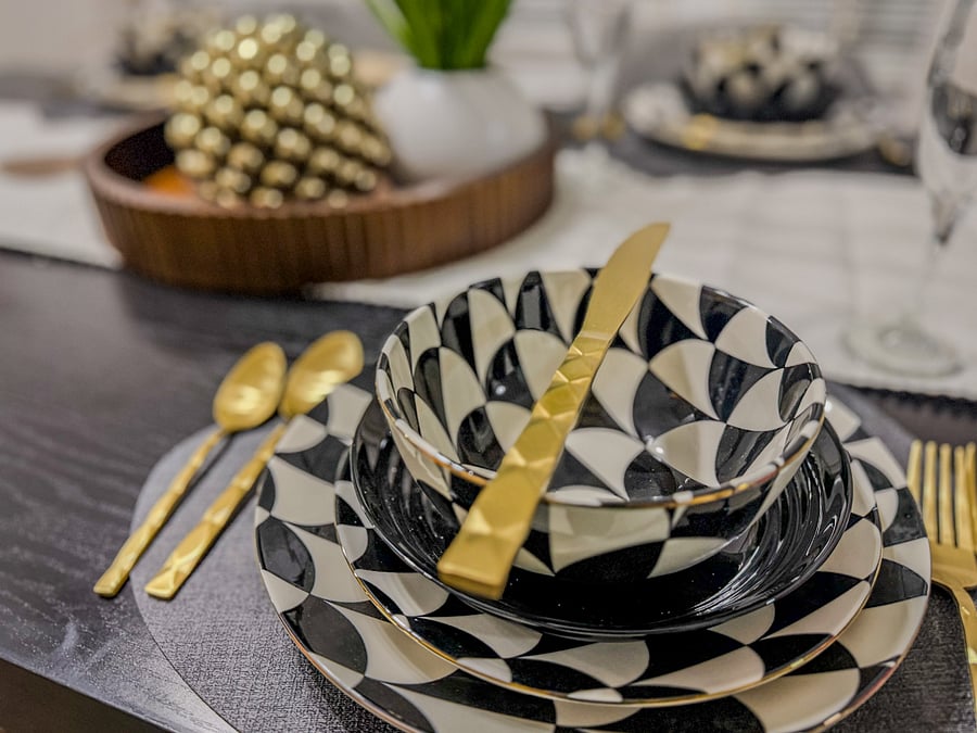 Dining setup with dishes and utensils provided.