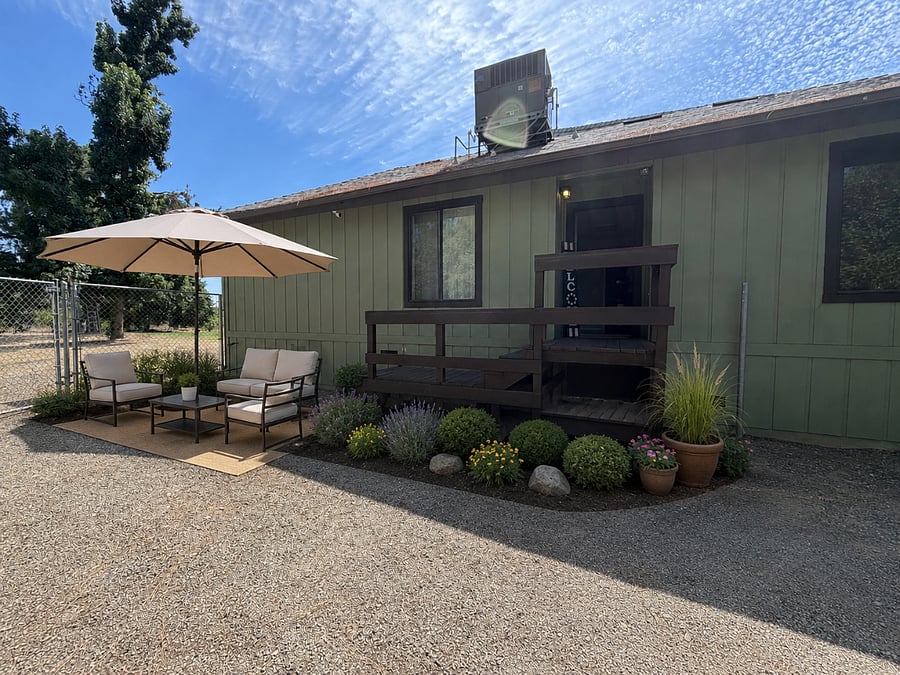 AI - created photo of what we anticipate the private patio to look like end of July 2026!