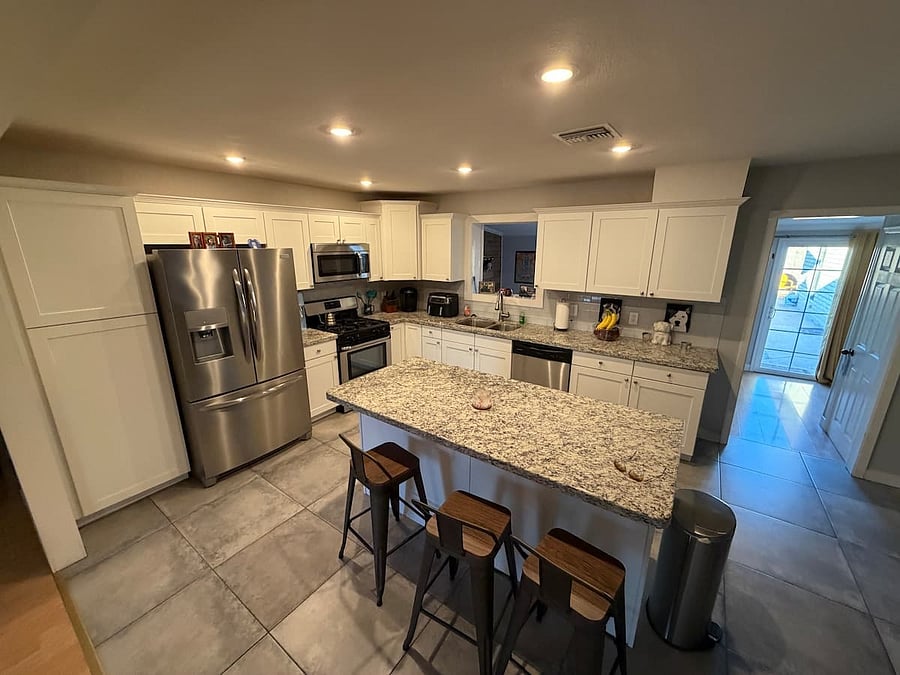 Kitchen with gas range.