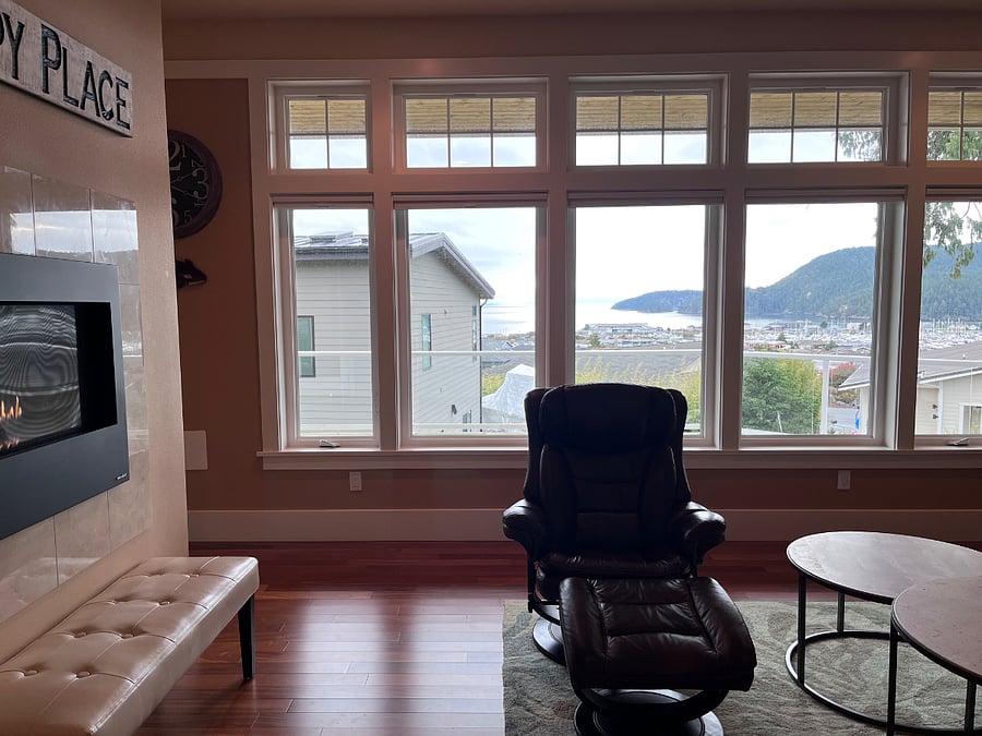 Living room with ocean view of Burrows Bay