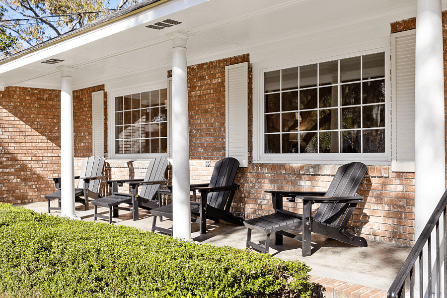 Front porch faces west so you can catch the sun going down over the treeline and enjoy the bask of golden hour.