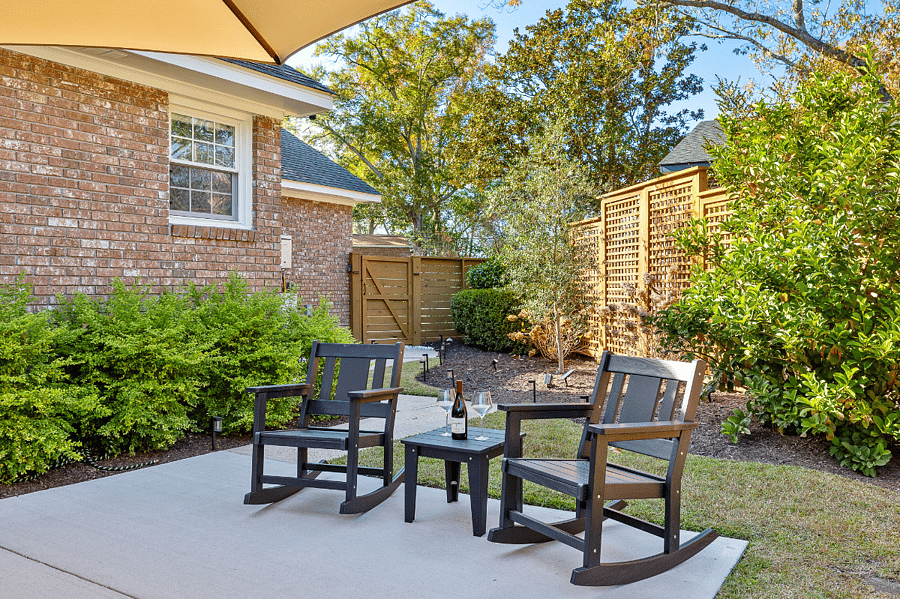 Lots of different seating options, newly landscaped backyard, solar landscape lights throughout!