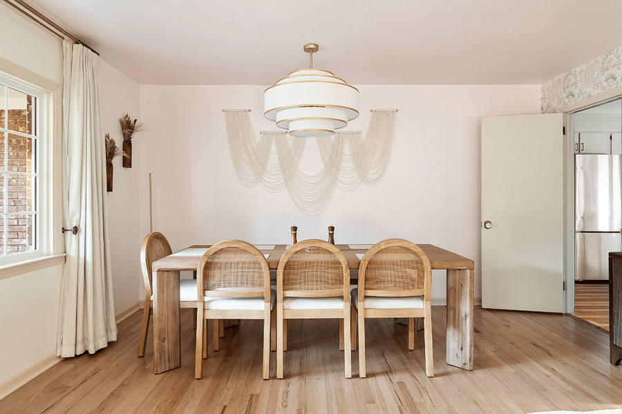 Formal dining room attached to the kitchen and living room. Great for family dinners, hosting or games nights!
