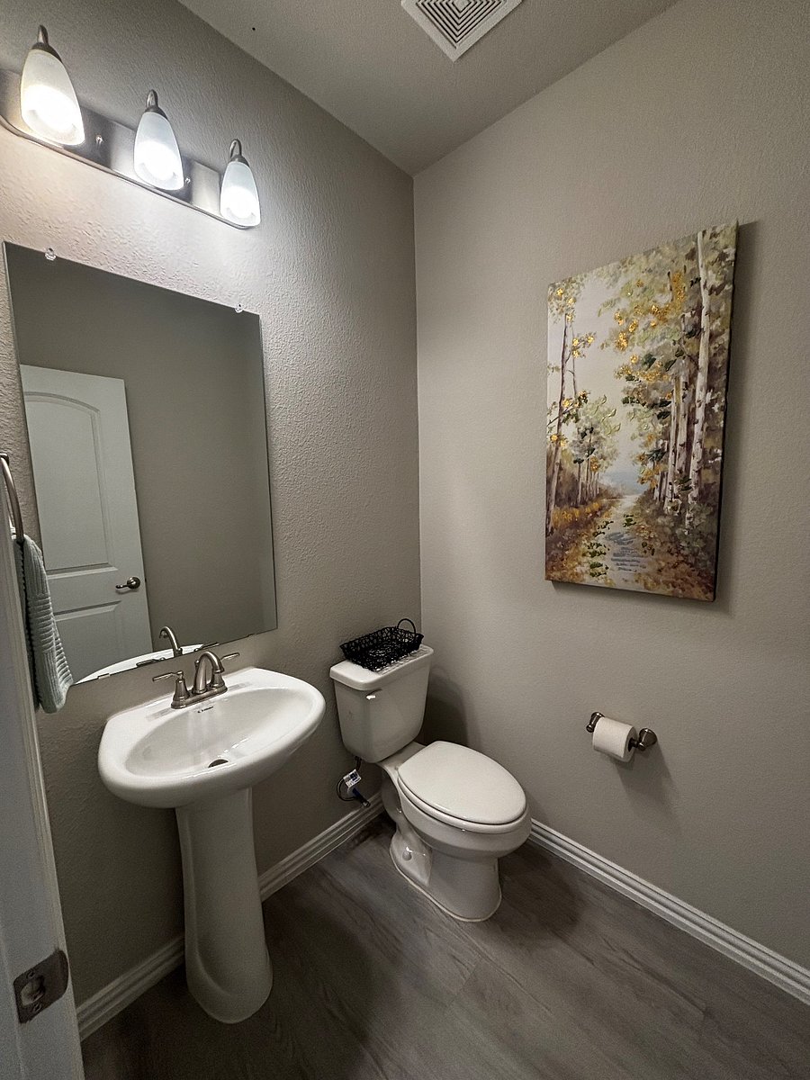 Main floor powder room/half bathroom.