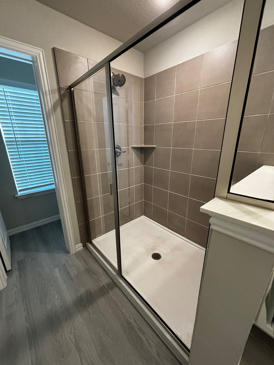 Primary bathroom walk-in shower.