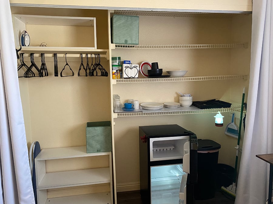 Mini Fridge with Freezer, Vacuum Cleaner, Mop, Dishes, Glasses, Silverware, Cooking Utensils, Trash Can, Travel Iron & Board Provided