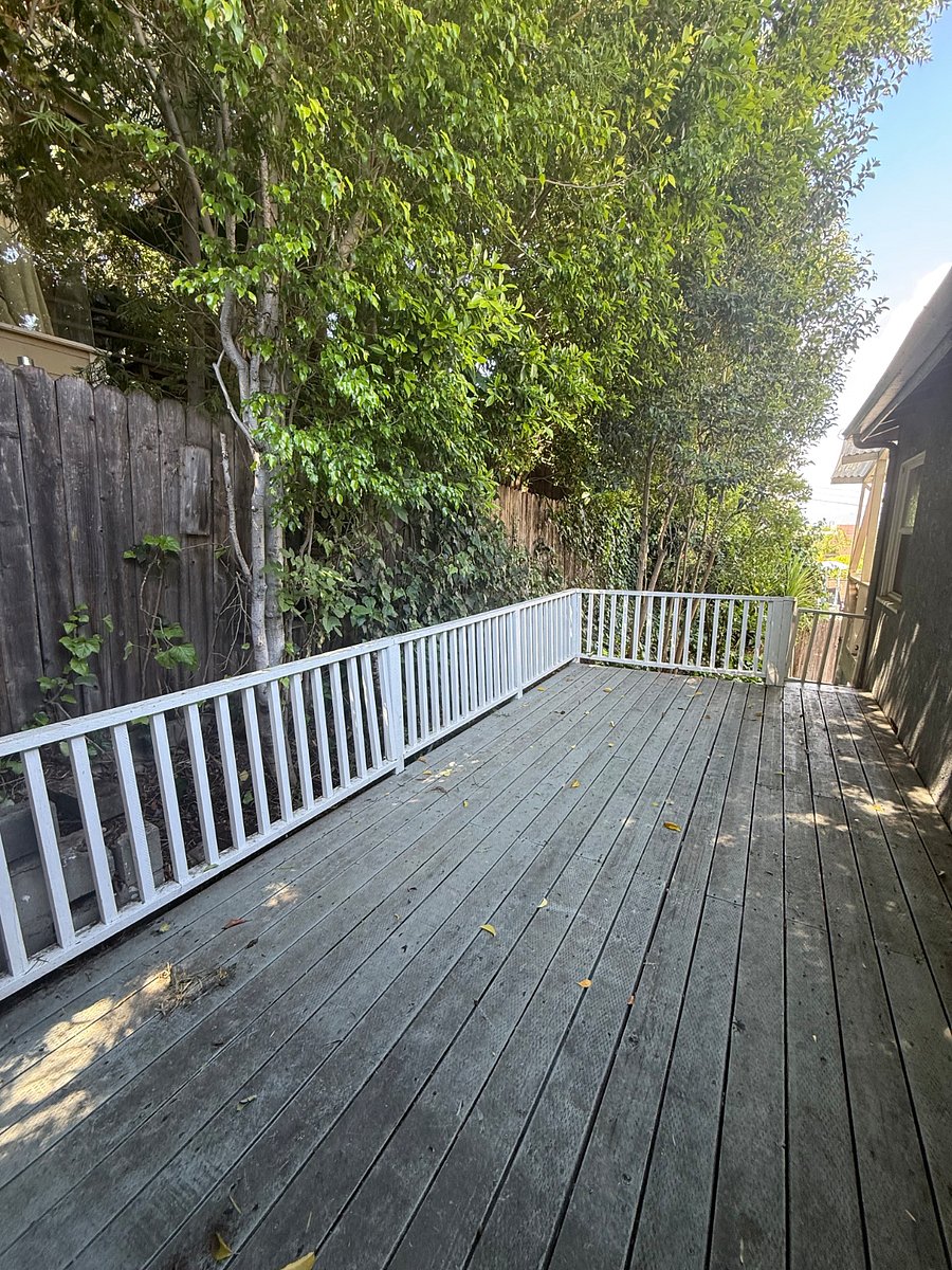 Wooded deck from french doors - Primary Bedroom