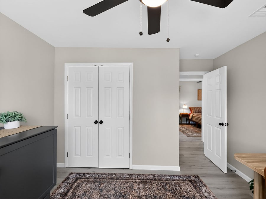 2nd floor / bedroom 2 / king bed / closet / hanging organizer / ceiling fan / portable fans as well / AC in every room 