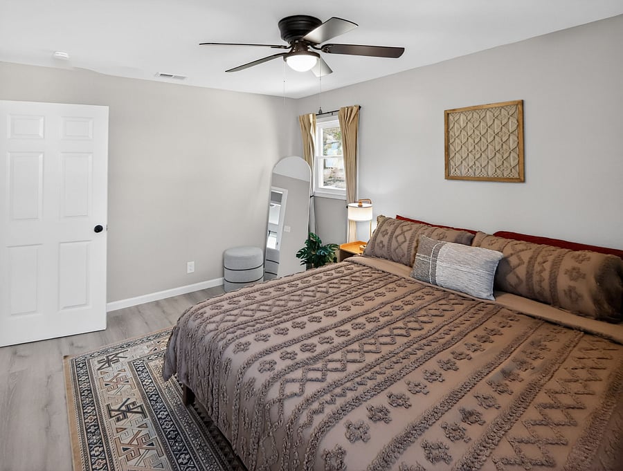 2nd floor / bedroom 1 / king bed / closet / hanging organizer / ceiling fan / portable fans as well / AC in every room 