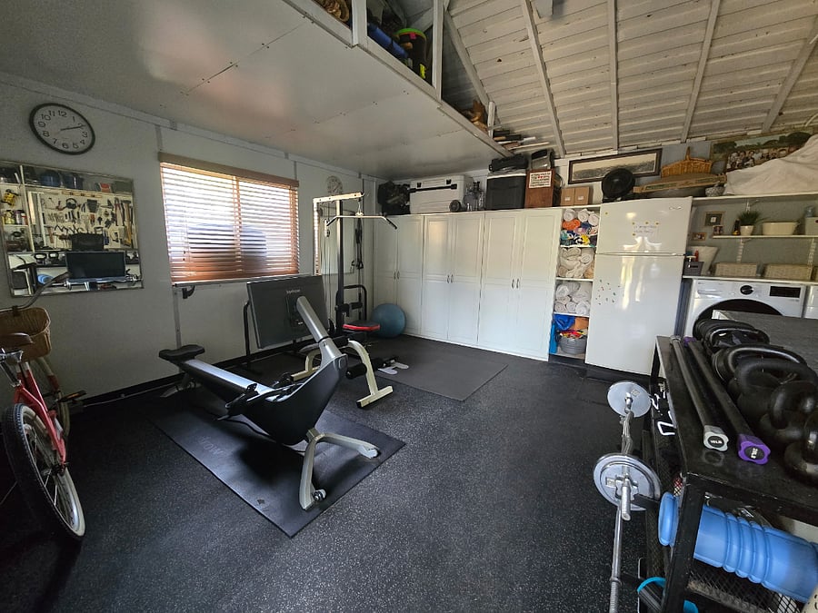 Small but mighty gym!
Hydro rowing machine, and lots of weights