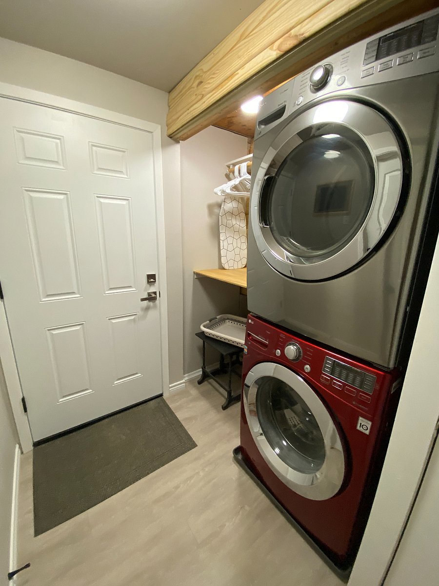 Stackable washer & dryer makes laundry a breeze with direct access from your suite!  And direct access into the 1 Car Garage keeps you dry when the East Texas Rains arrive!