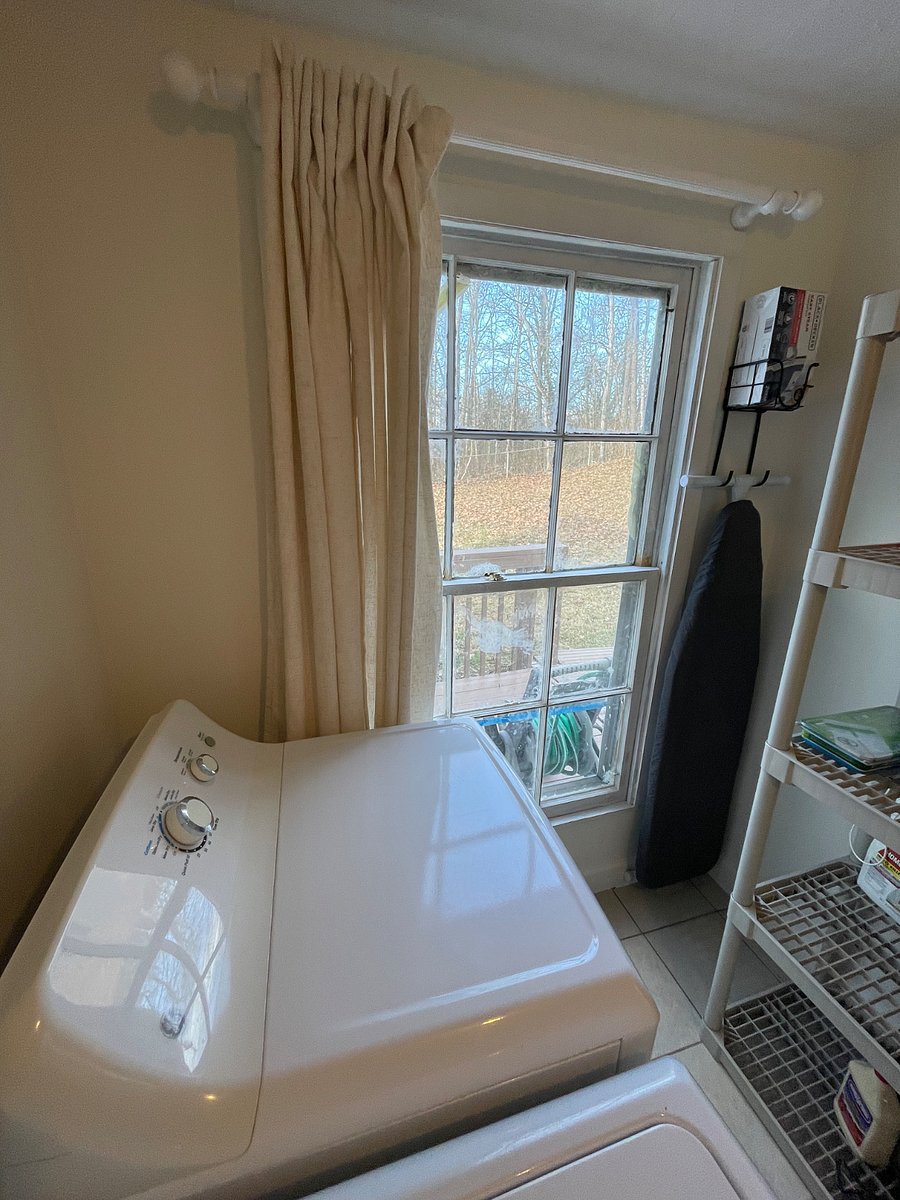 Laundry - full-size washer/dryer. Ironing board and iron. Extra storage shelves. Mud sink and door to back deck.