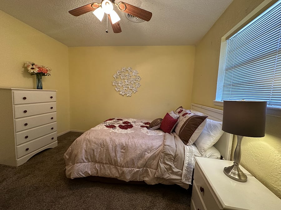 Front bedroom with double bed, closet
