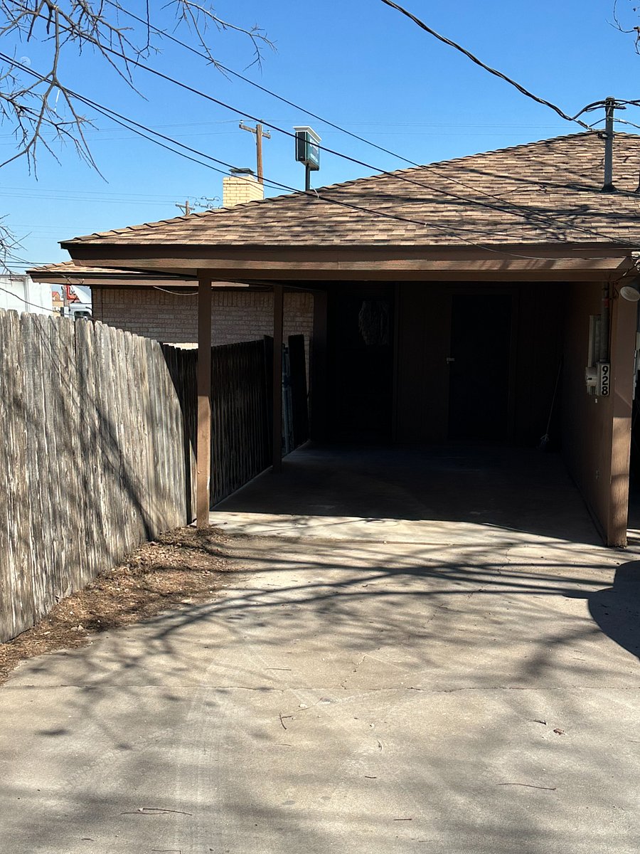 Covered parking in back for one vehicle, plus additional vehicle behind.  Fenced in yard.
