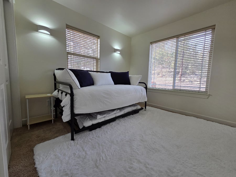 Bedroom 1 with daybed + trundle bed.