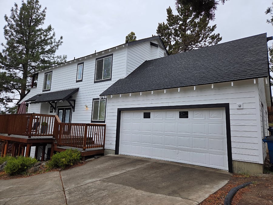 Side entrance, deck, and garage