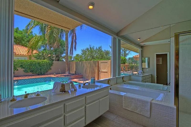 Soak in the spa tub. this Jr master bath redefines relaxation